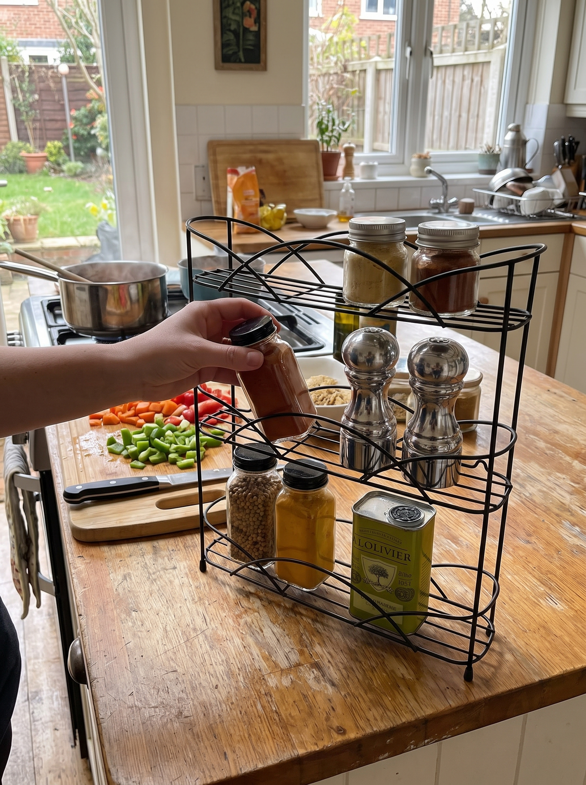 3-Tier Wire Spice Rack Organizer mounted on a kitchen wall